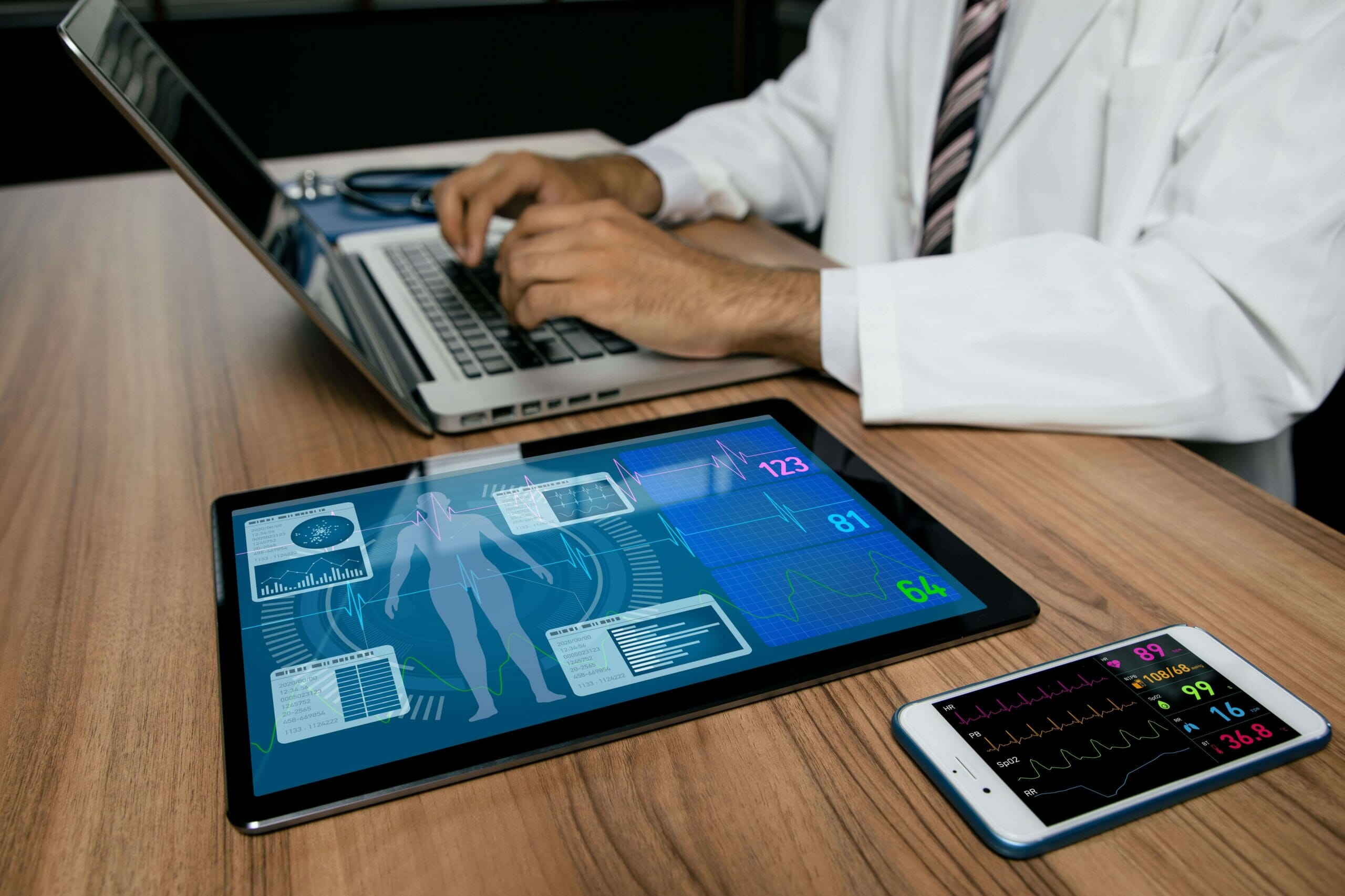 doctor using remote patient monitoring for patient data